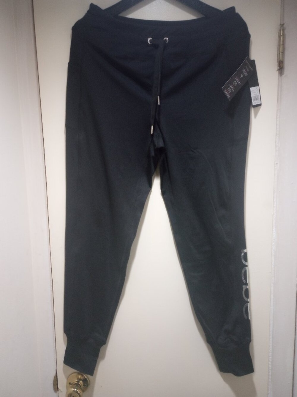 Bebe sport pants Black size S 2 side pockets New w/tags!